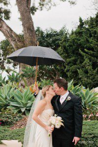 bride groom biltmore umbrella kissing